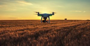 DroneQuadricopter2-1250x650 Drone helicopter over field