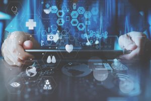 smart doctor hand working with modern laptop computer in modern office with virtual icon diagram Man holding ipad with tech icons floating around
