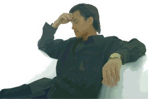 ThinkstockPhotos-122462018 copy Man with headache on couch