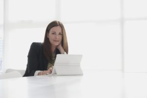 real estate agent in front of computer