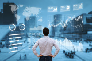 Person analyzing financial dashboard with KPI and business district background Man standing in front of graphics