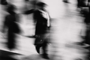 200294201-001 Blurry photos of businessman walking
