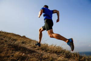 Man running up hill