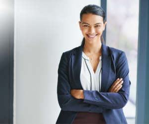 Empowered Smiling business woman arms crossed