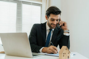 real estate agent professional making business call, talking on mobile phone with customer
