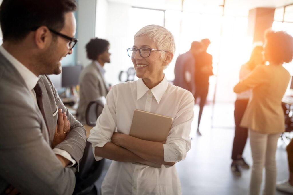 Real estate agents forging connections at a business networking event 