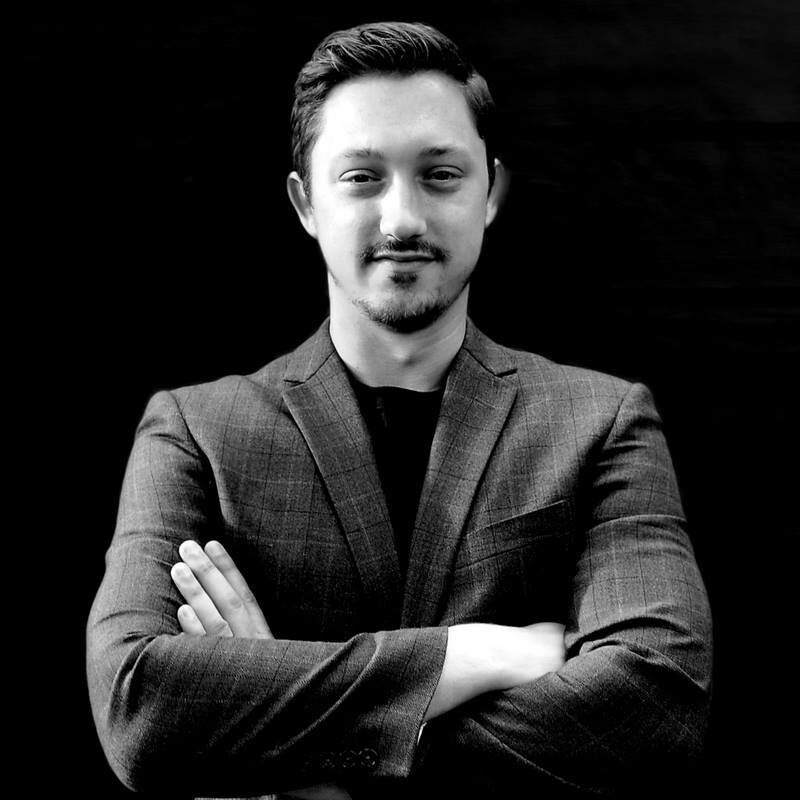 Businessman arms crossed black & white photo